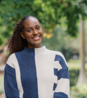 Ceazia Wright standing in front of the Administration Building.