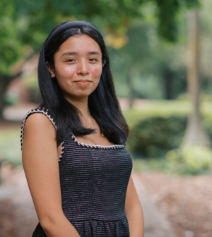 Jocelyn Ramirez standing in front of the Administration Building