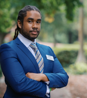 Rayhan Stapleton standing in front of the Administration Building