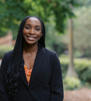 Ijeoma Omorogbe standing in front of the Administration Building