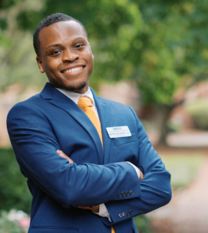 Deven Jackson standing in front of the Administration Building