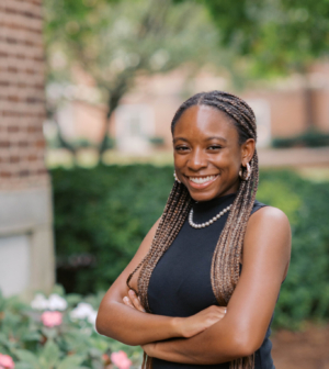 Alisha Mitchell standing in front of the Administration Building